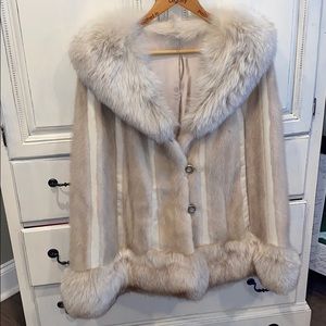 Handmade leather, and fur wrap with satin lining